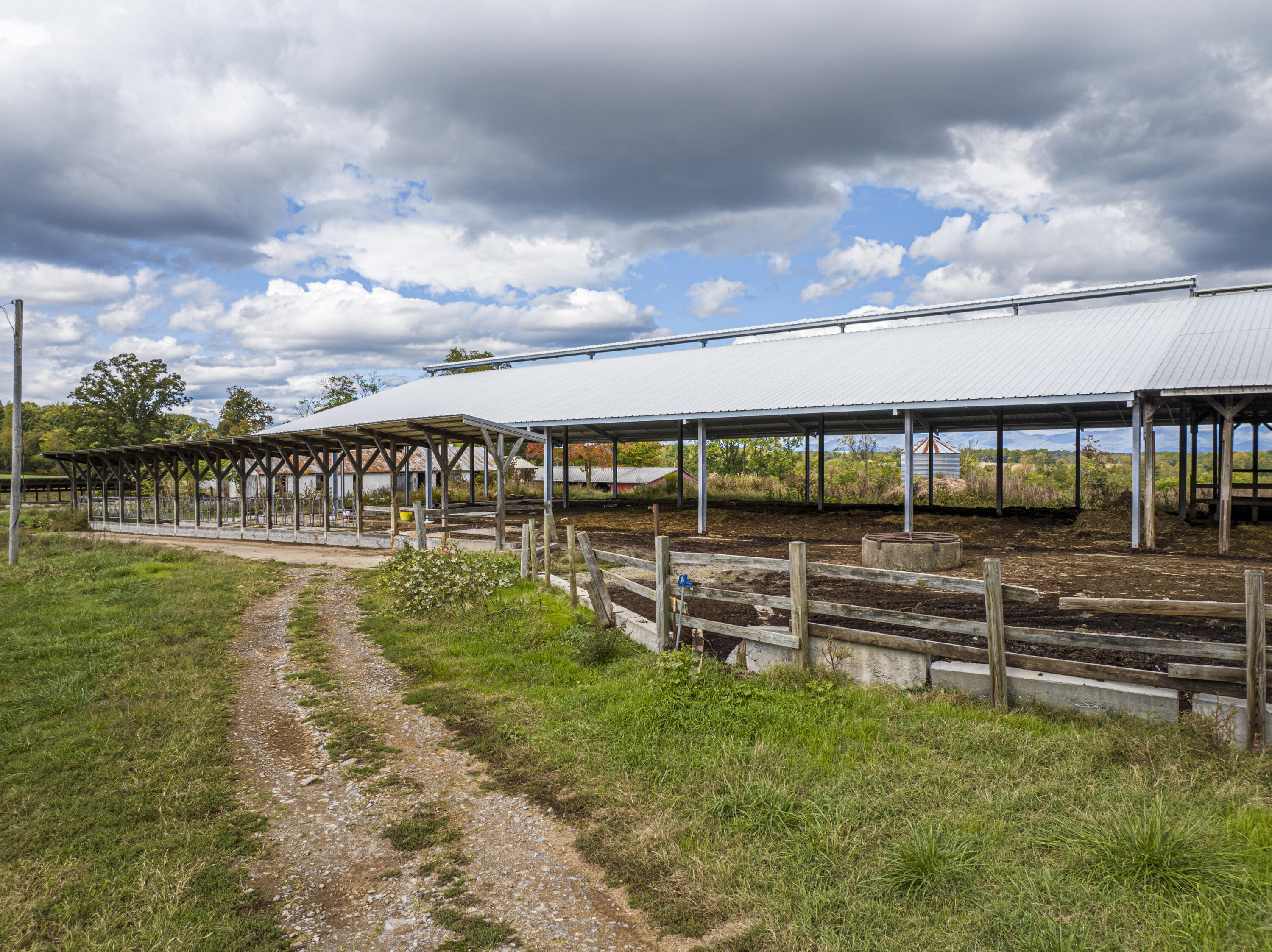 9961 Falling Creek Road Huddleston, VA 24104 - Photo 26 of 39 a view of a swimming pool with a garden