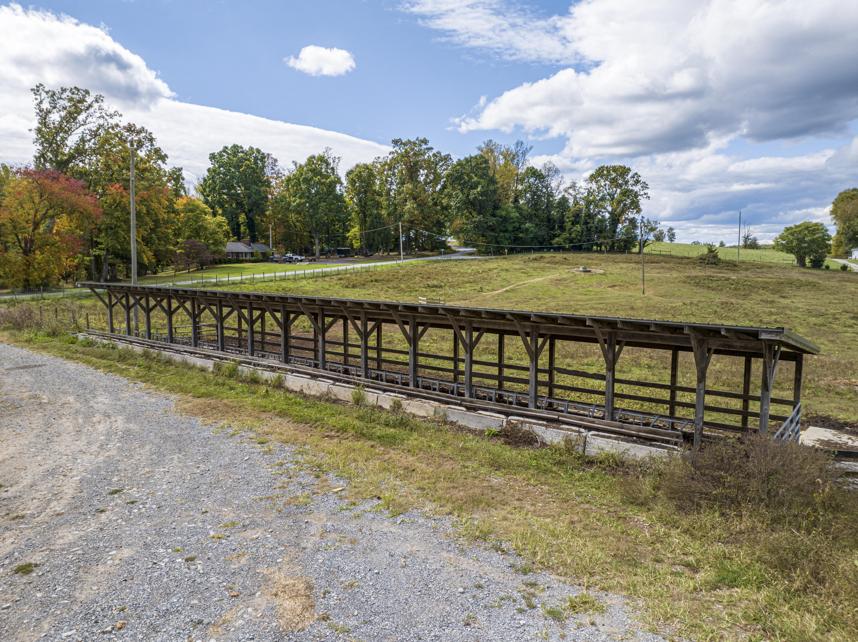 9961 Falling Creek Road Huddleston, VA 24104 - Photo 28 of 39 a view of a swimming pool with a bench