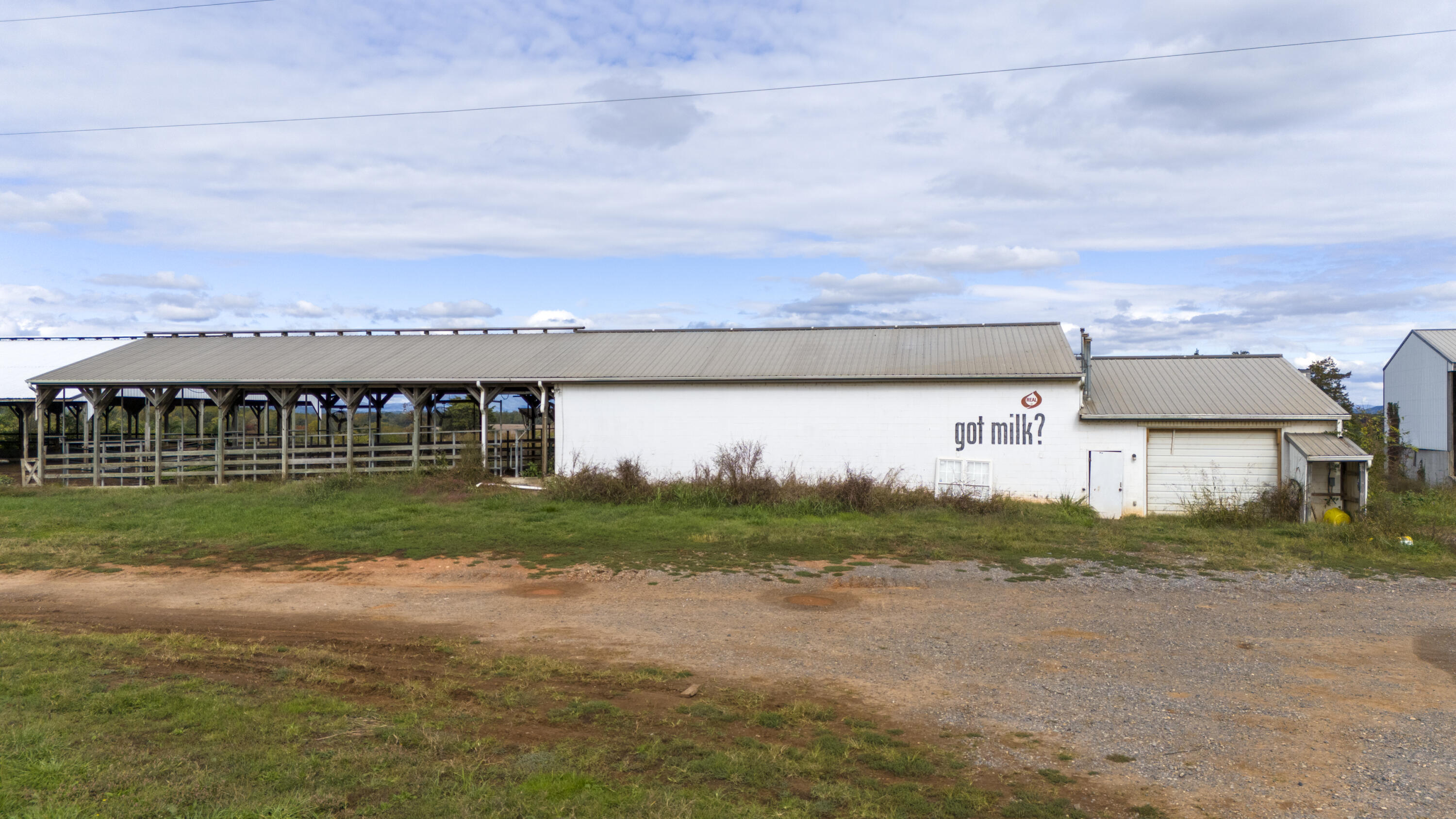9961 Falling Creek Road Huddleston, VA 24104 - Photo 4 of 39 a view of a big yard with palm trees
