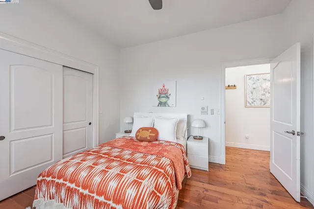 a white bath tub sitting in a bathroom next to a window