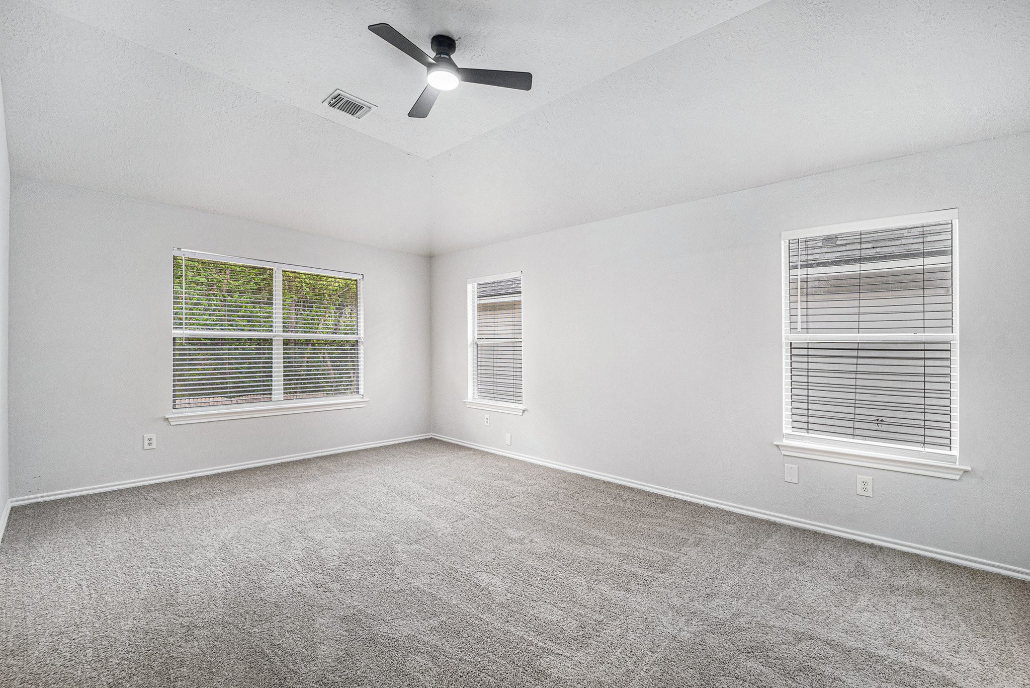18131 Stone Trail Manor Drive Humble, TX 77346 - Photo 16 of 31 a view of an empty room with a window