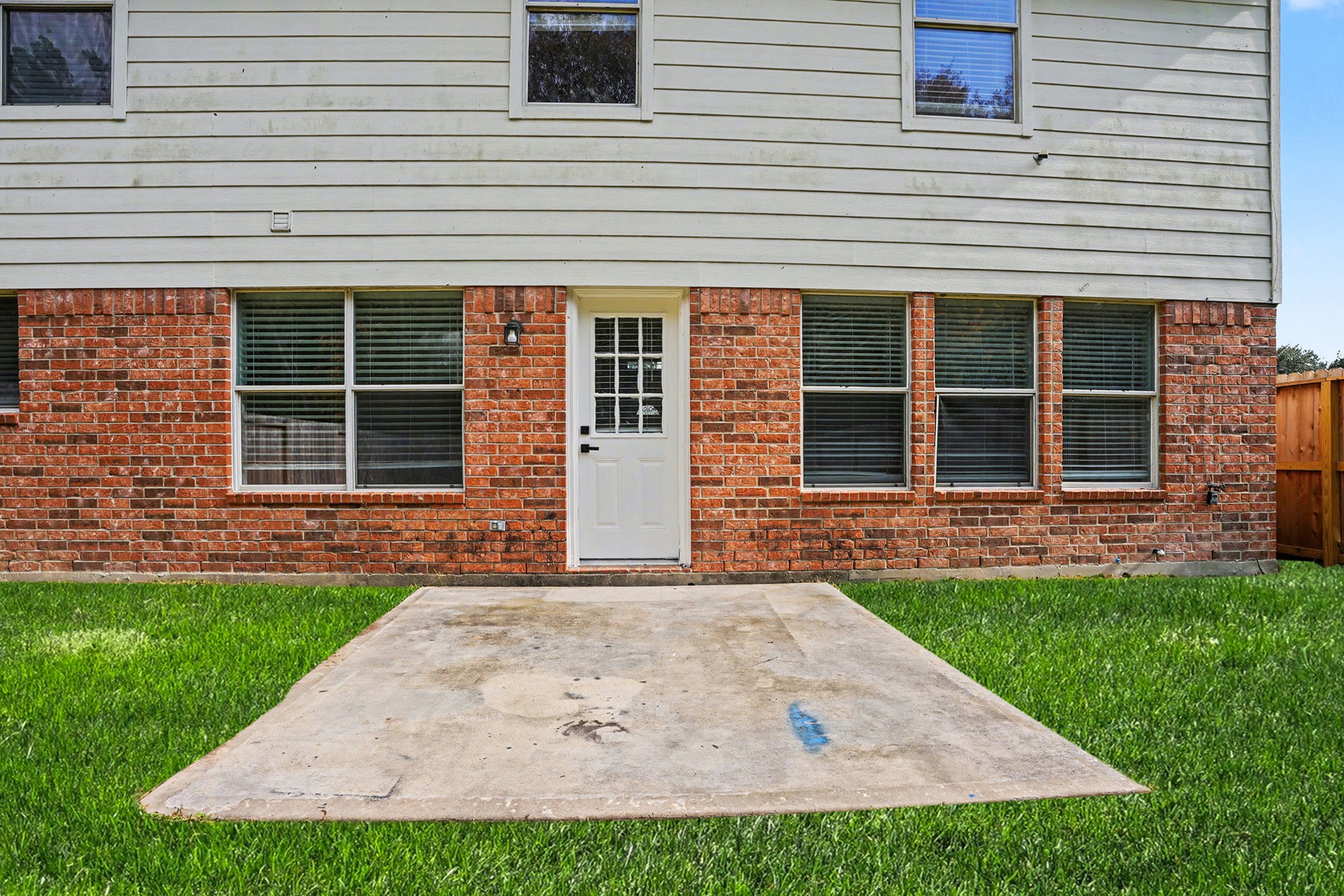 18131 Stone Trail Manor Drive Humble, TX 77346 - Photo 26 of 31 a front view of a house with a yard