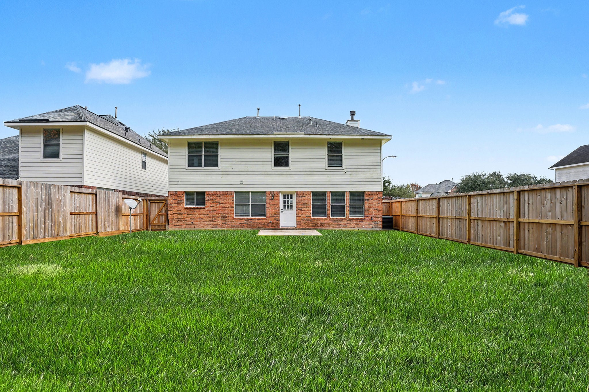 18131 Stone Trail Manor Drive Humble, TX 77346 - Photo 27 of 31 a view of a house with backyard