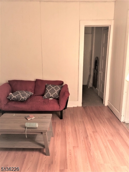 28 Mohawk Avenue, Unit 2 Sparta, NJ 07871 - Photo 3 of 4 a living room with furniture and wooden floor