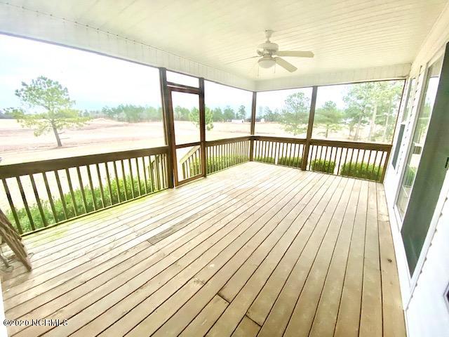 200 Old Tom Morris Road Garland, NC 28441 - Photo 33 of 38 Rear Porch with Entry to Family Room and Kitchen