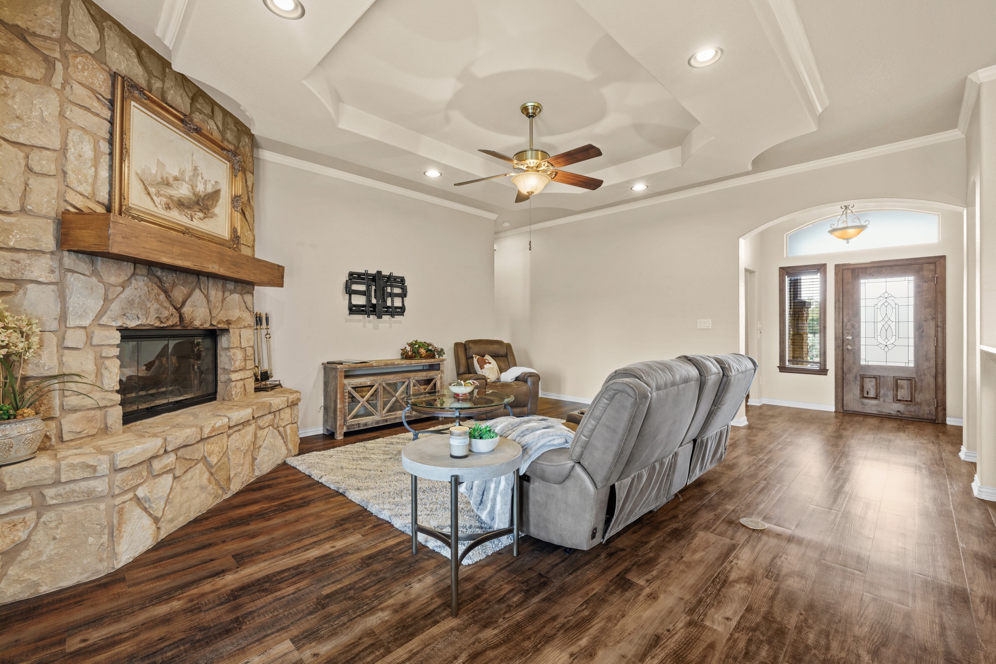 204 Skyline Road Georgetown, TX 78628 - Photo 14 of 40 Living area featuring ornamental molding, ceiling fan, recessed lighting, dark wood finished floors, and a fireplace