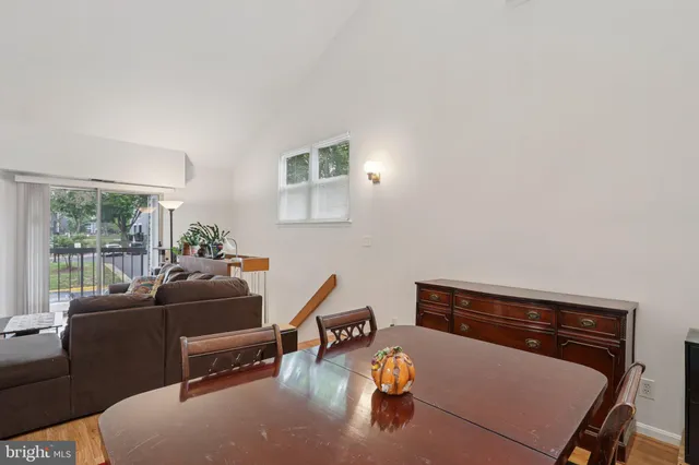 a kitchen with a sink a stove and cabinets