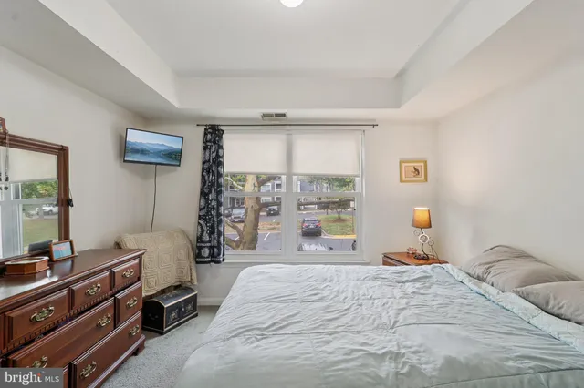 a view of balcony with wooden floor