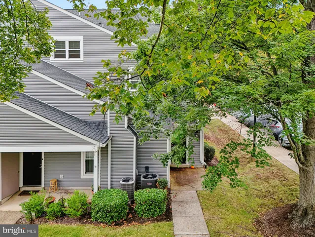 an aerial view of a house with a garden