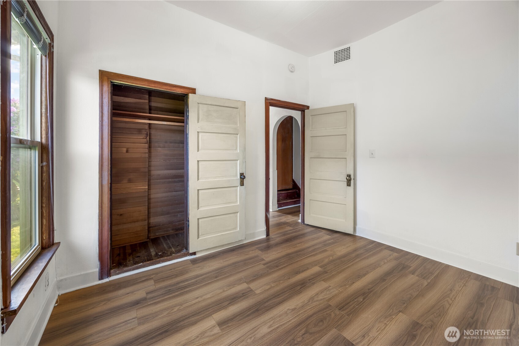 1624 Wright Avenue Sumner, WA 98390 - Photo 13 of 29 an empty room with closet and mirror