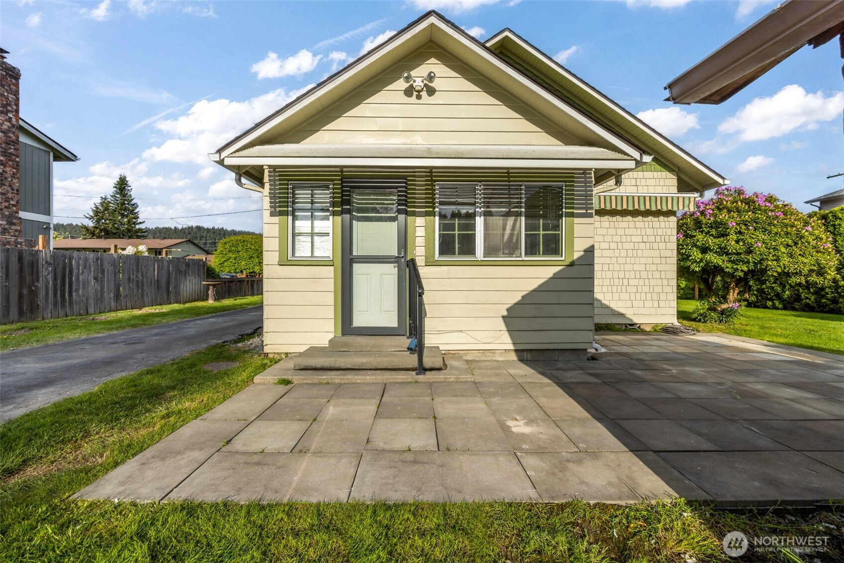 1624 Wright Avenue Sumner, WA 98390 - Photo 26 of 29 a front view of a house with a yard