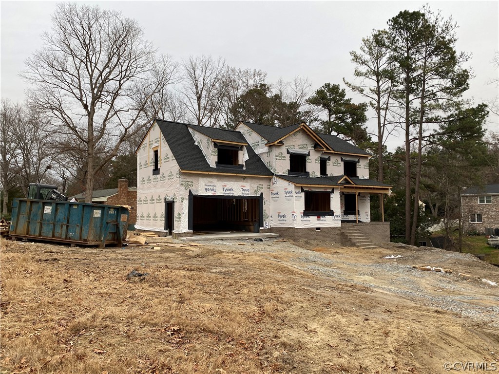 3822 Cresthill Road Chester, VA 23831 - Photo 1 of 5 a front view of a house with a yard
