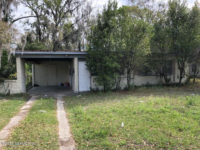 6019 Temple Road Jacksonville, FL 32217 - Photo 1 of 14 a view of a backyard with plants and large tree
