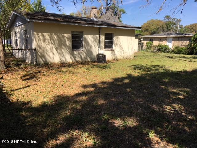 6019 Temple Road Jacksonville, FL 32217 - Photo 12 of 14 a front view of a house with a yard