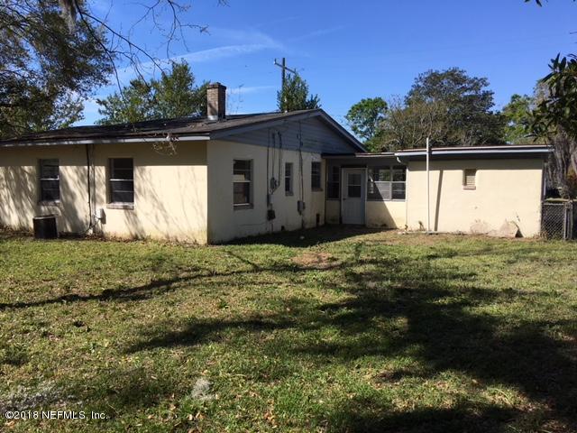 6019 Temple Road Jacksonville, FL 32217 - Photo 9 of 14 a house with green field in front of it