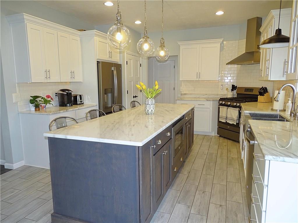 289 Durst Road Irwin, PA 15642 - Photo 6 of 25 GOURMET KITCHEN WITH HUGE ISLAND AND UPSCALE FEATURES