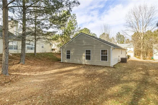 $249,900 | 7137 Ravenwood Lane, Lithonia, GA 30038