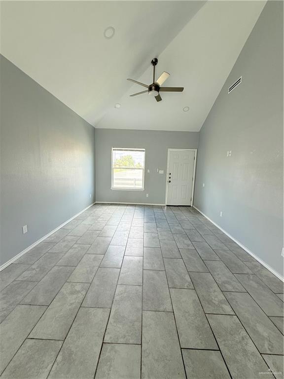 1421 North 21st Street, Unit 2 McAllen, TX 78501 - Photo 5 of 13 a view of an empty room with a window