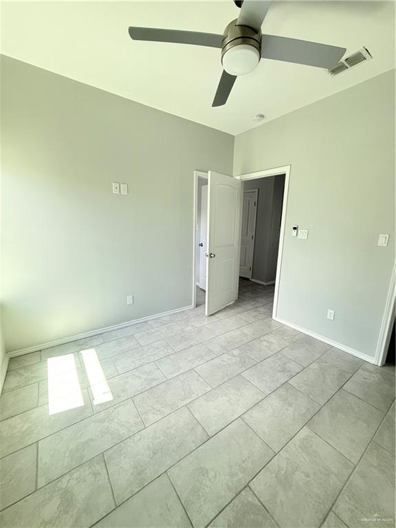 1421 North 21st Street, Unit 2 McAllen, TX 78501 - Photo 6 of 13 a view of an empty room