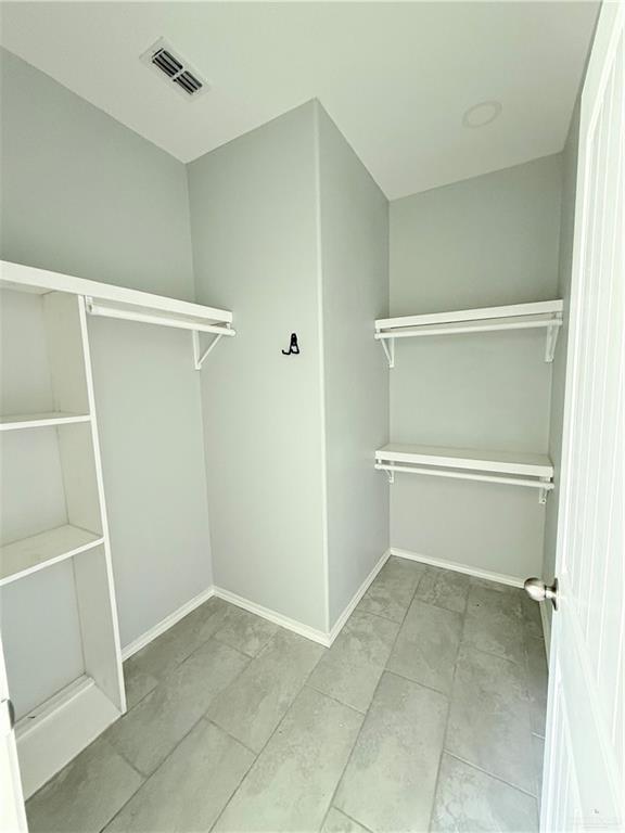 1421 North 21st Street, Unit 2 McAllen, TX 78501 - Photo 7 of 13 a view of an empty walk in closet