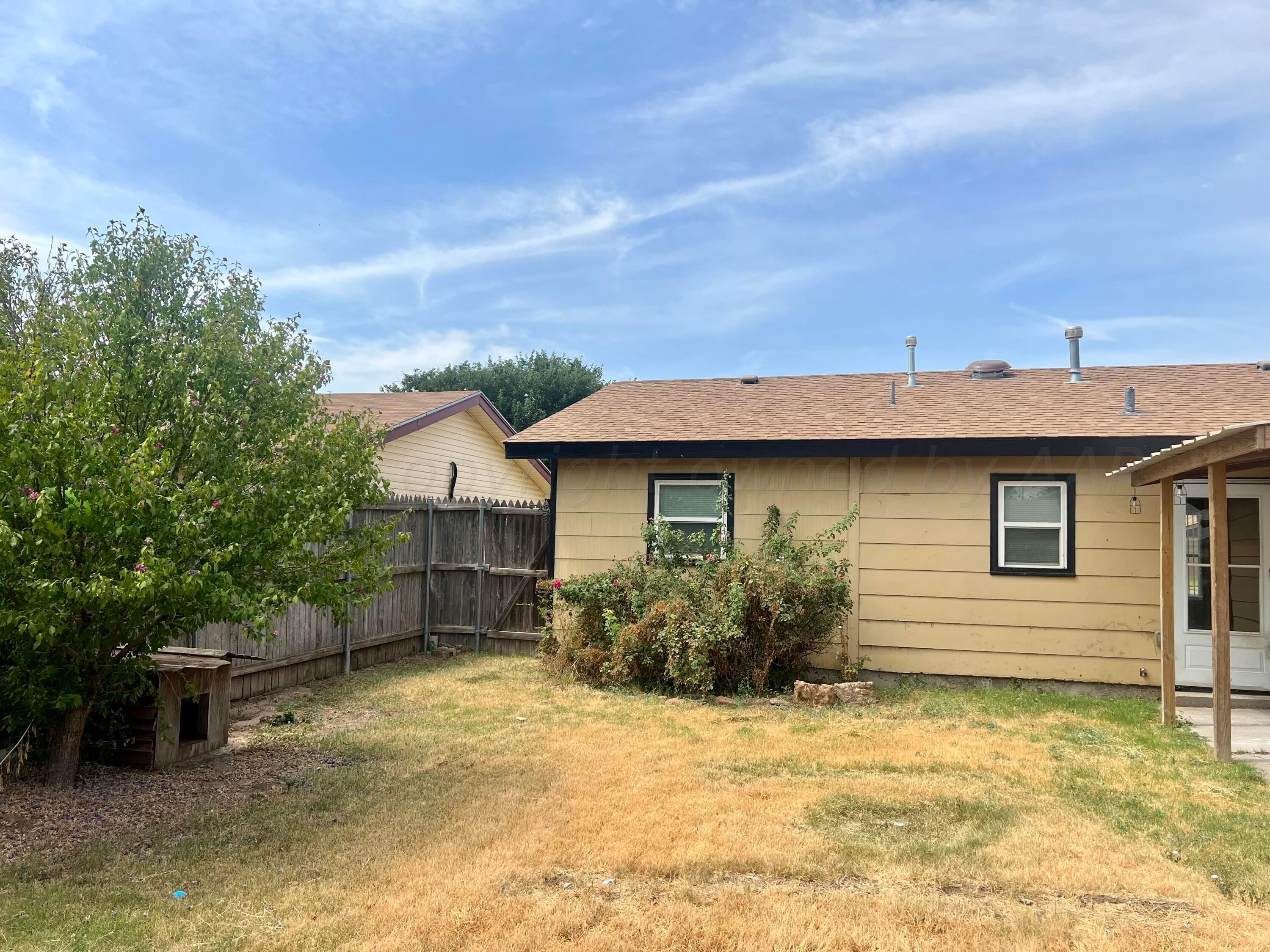2903 Bagarry Street Amarillo, TX 79103 - Photo 25 of 26 a view of a house with a backyard