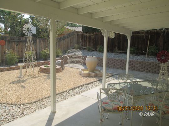 405 Vista Street Ridgecrest, CA 93555 - Photo 3 of 16 a backyard of a house