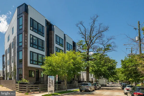 a view of a building with a street