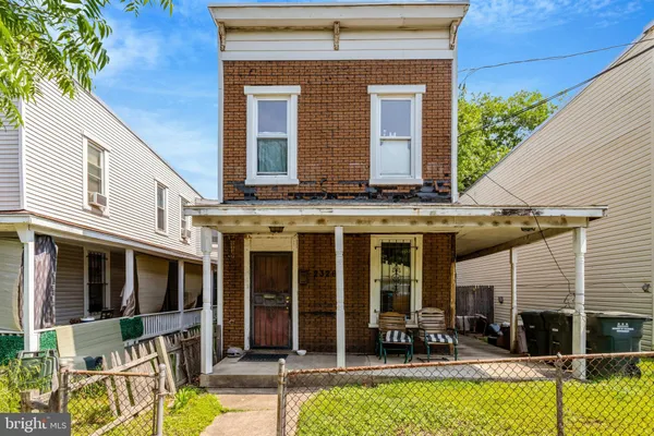 a view of a building with sitting area