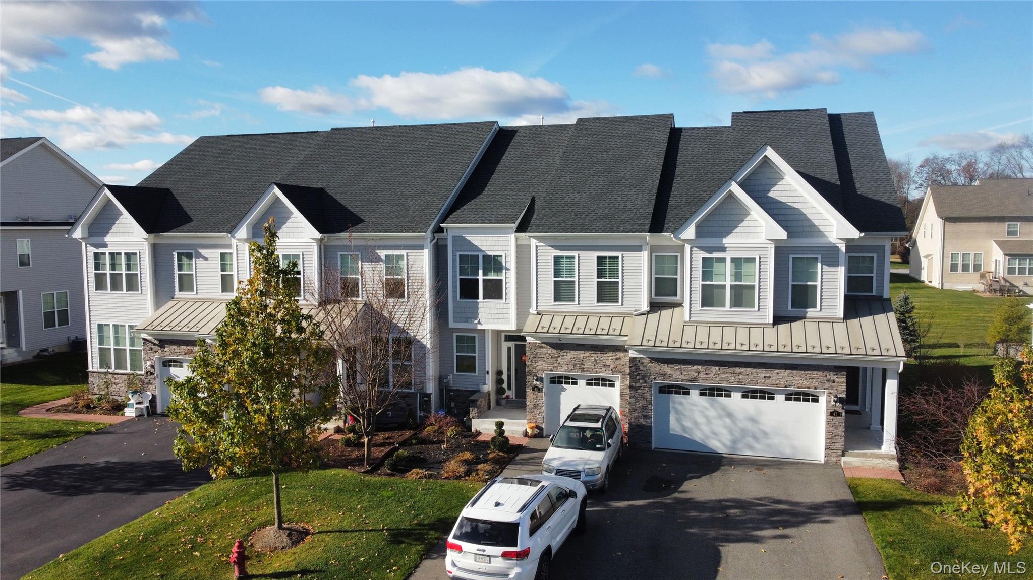 45 Lewis Road Hopewell Junction, NY 12533 - Photo 1 of 34 a front view of a house with a garden