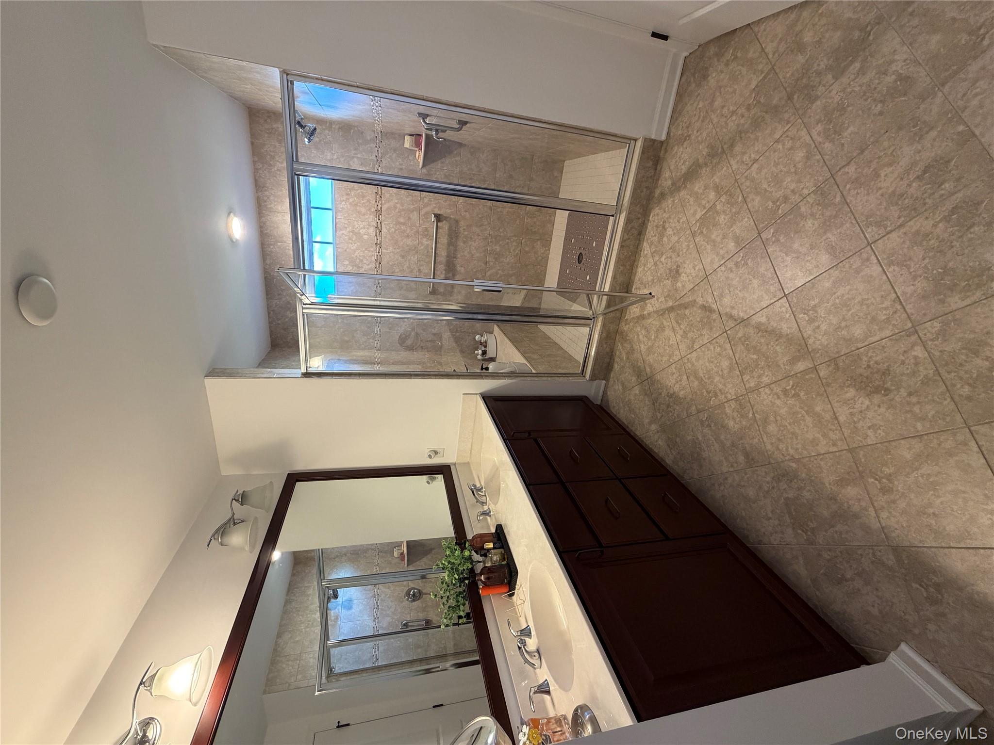 45 Lewis Road Hopewell Junction, NY 12533 - Photo 14 of 34 a room with a cabinets sink and mirror