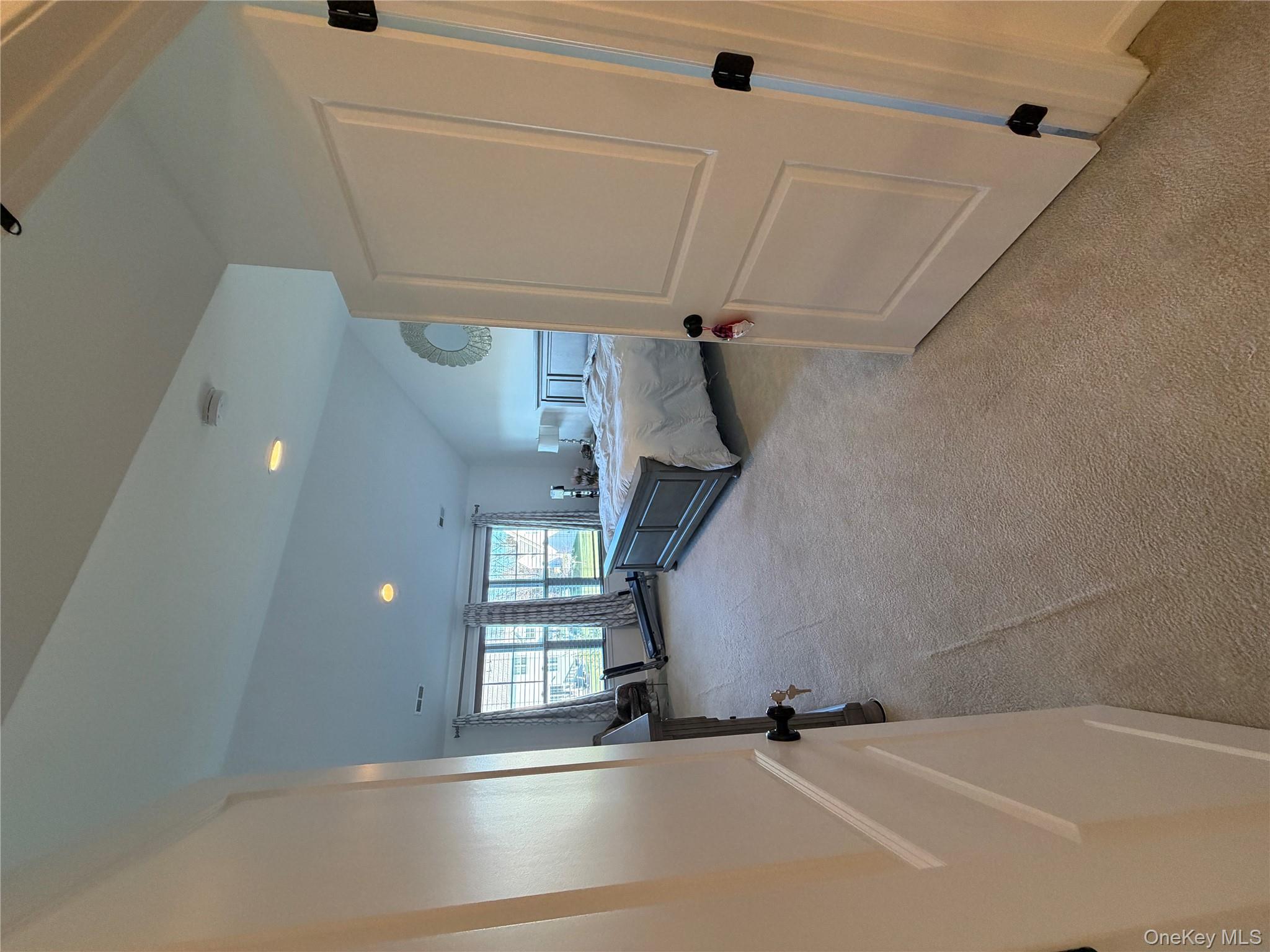 45 Lewis Road Hopewell Junction, NY 12533 - Photo 17 of 34 a living room with furniture and a window