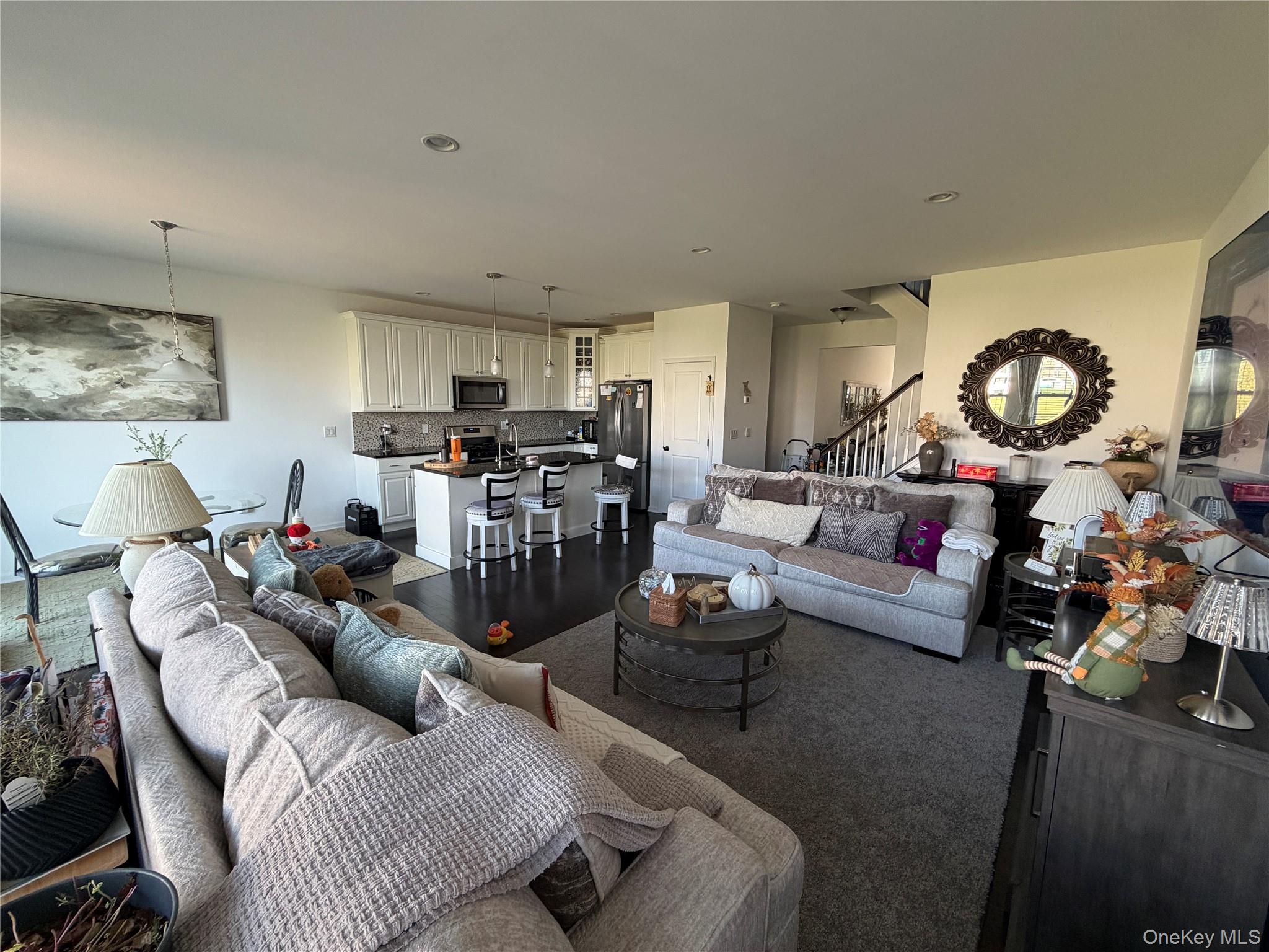 45 Lewis Road Hopewell Junction, NY 12533 - Photo 18 of 34 a living room with furniture and a flat screen tv