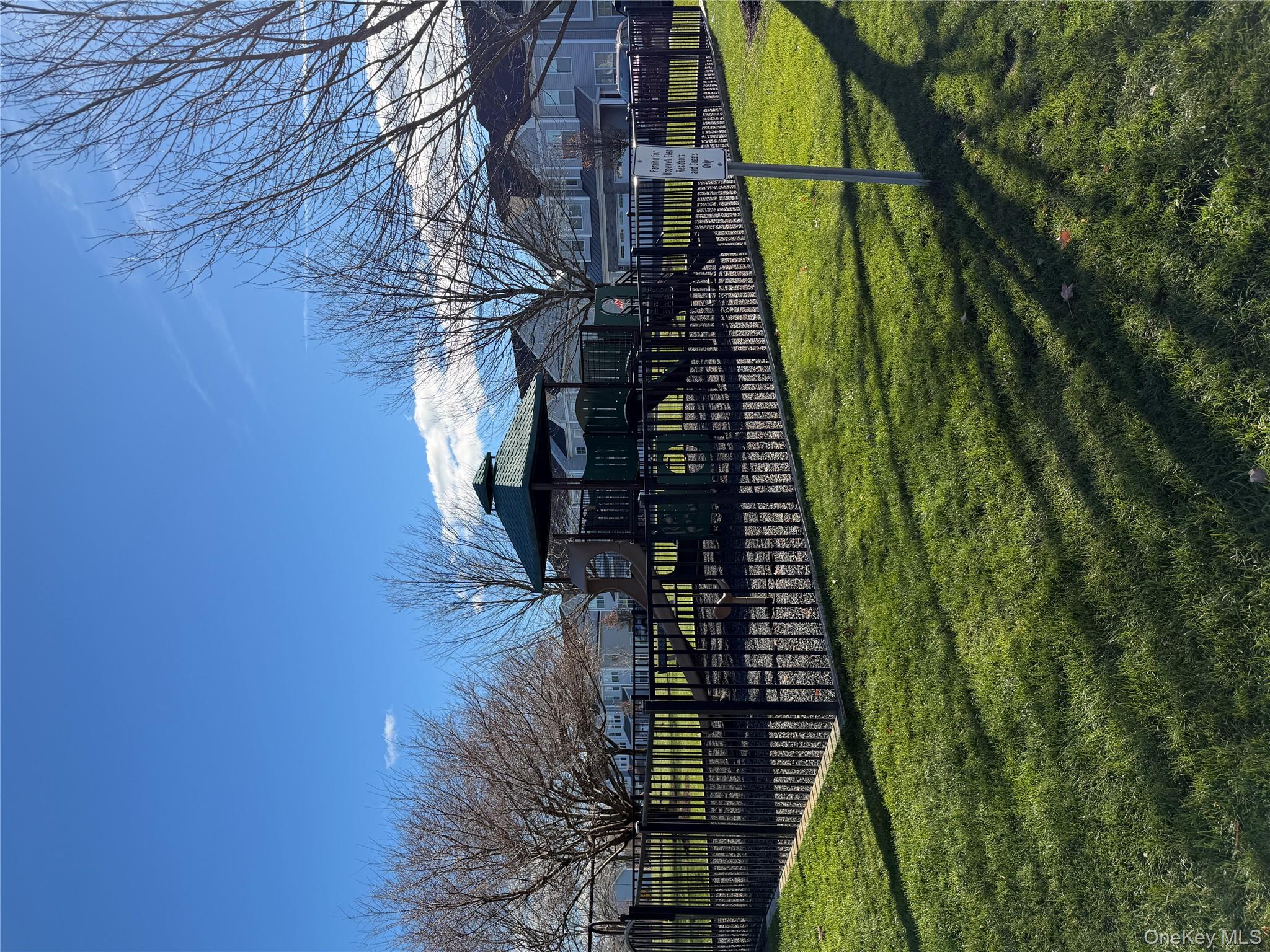 45 Lewis Road Hopewell Junction, NY 12533 - Photo 21 of 34 a view of a house next to a yard with wooden fence
