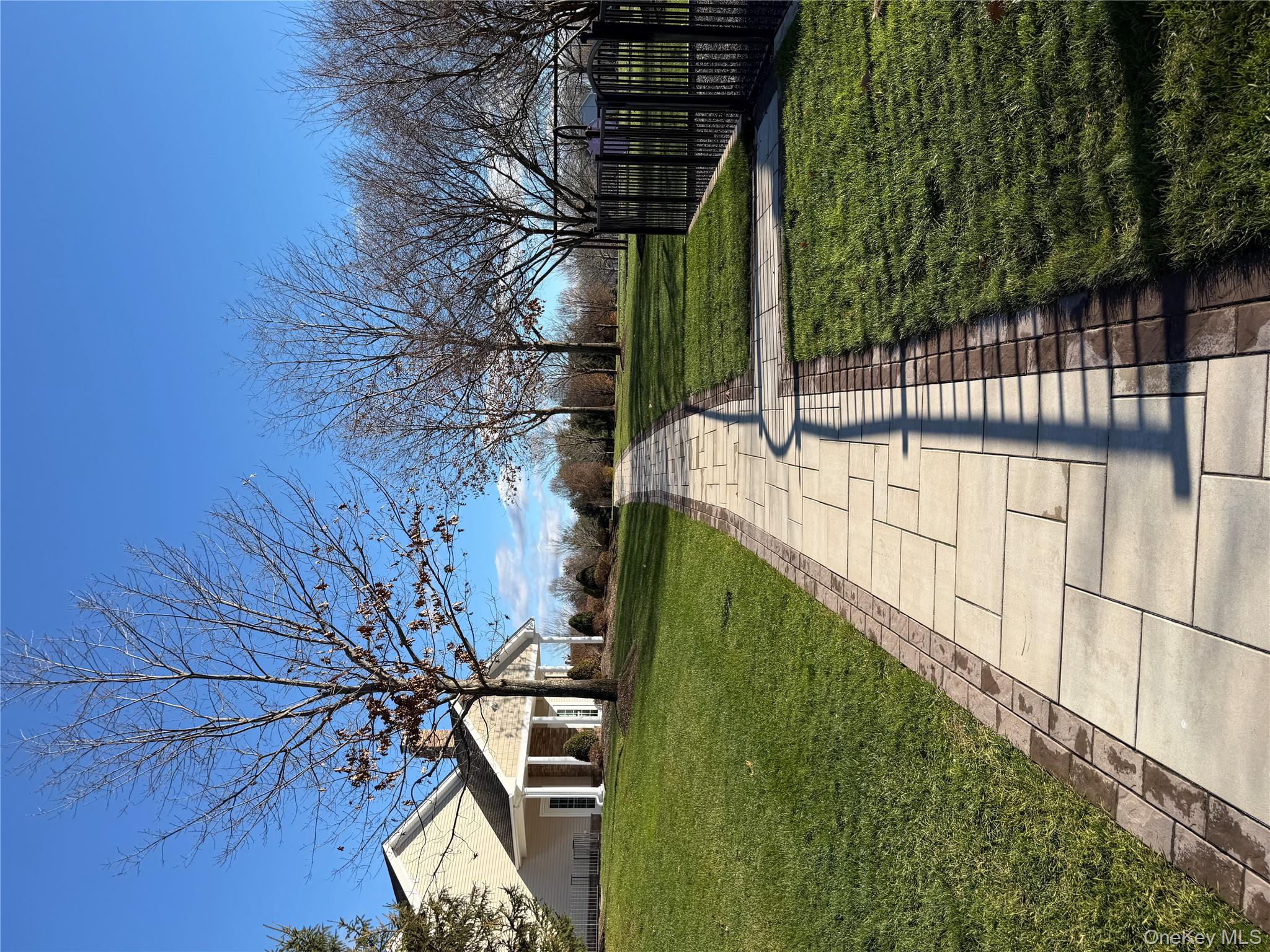 45 Lewis Road Hopewell Junction, NY 12533 - Photo 22 of 34 a backyard of a house with lots of green space