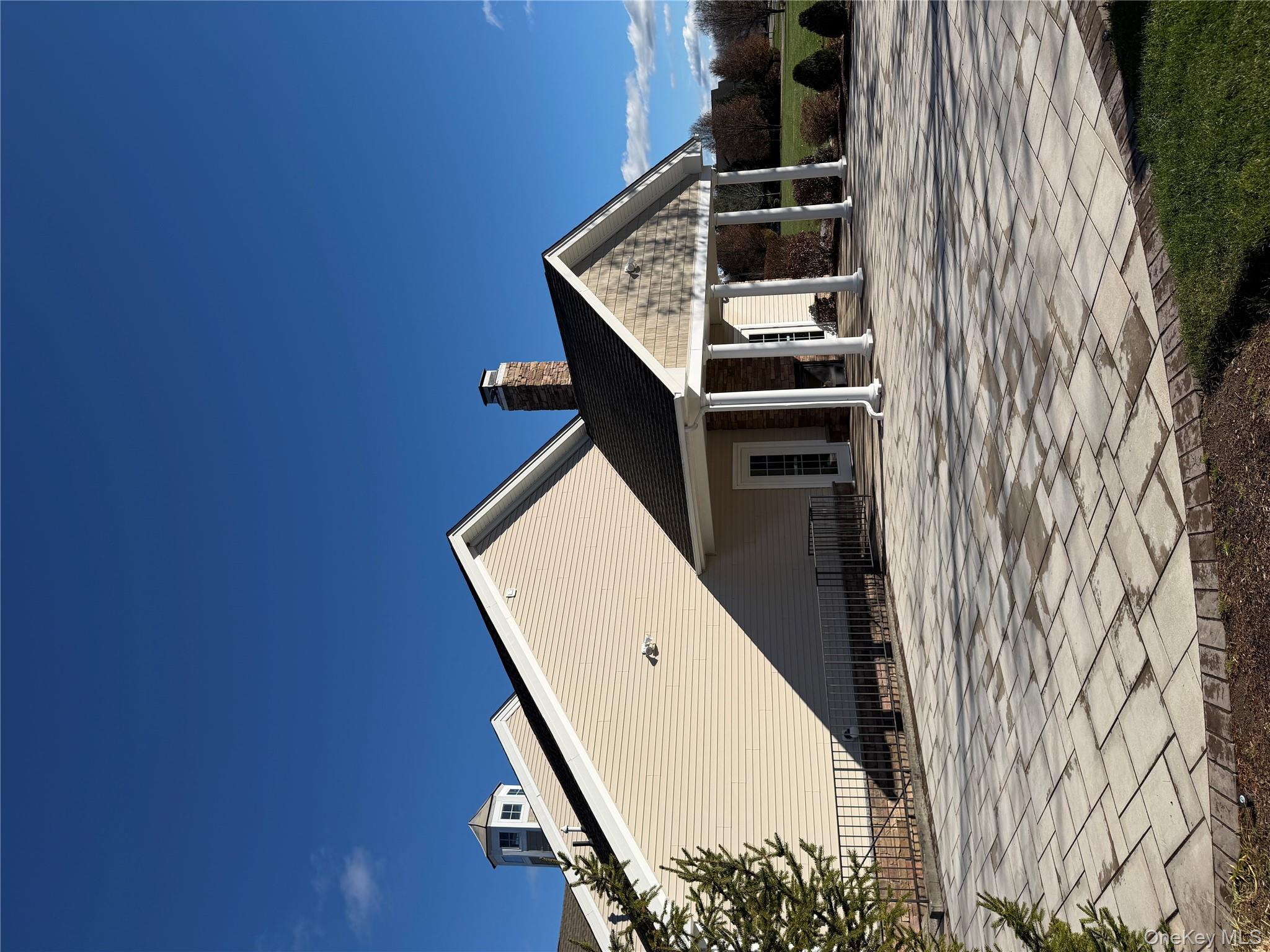 45 Lewis Road Hopewell Junction, NY 12533 - Photo 26 of 34 a front view of a house with a ocean view