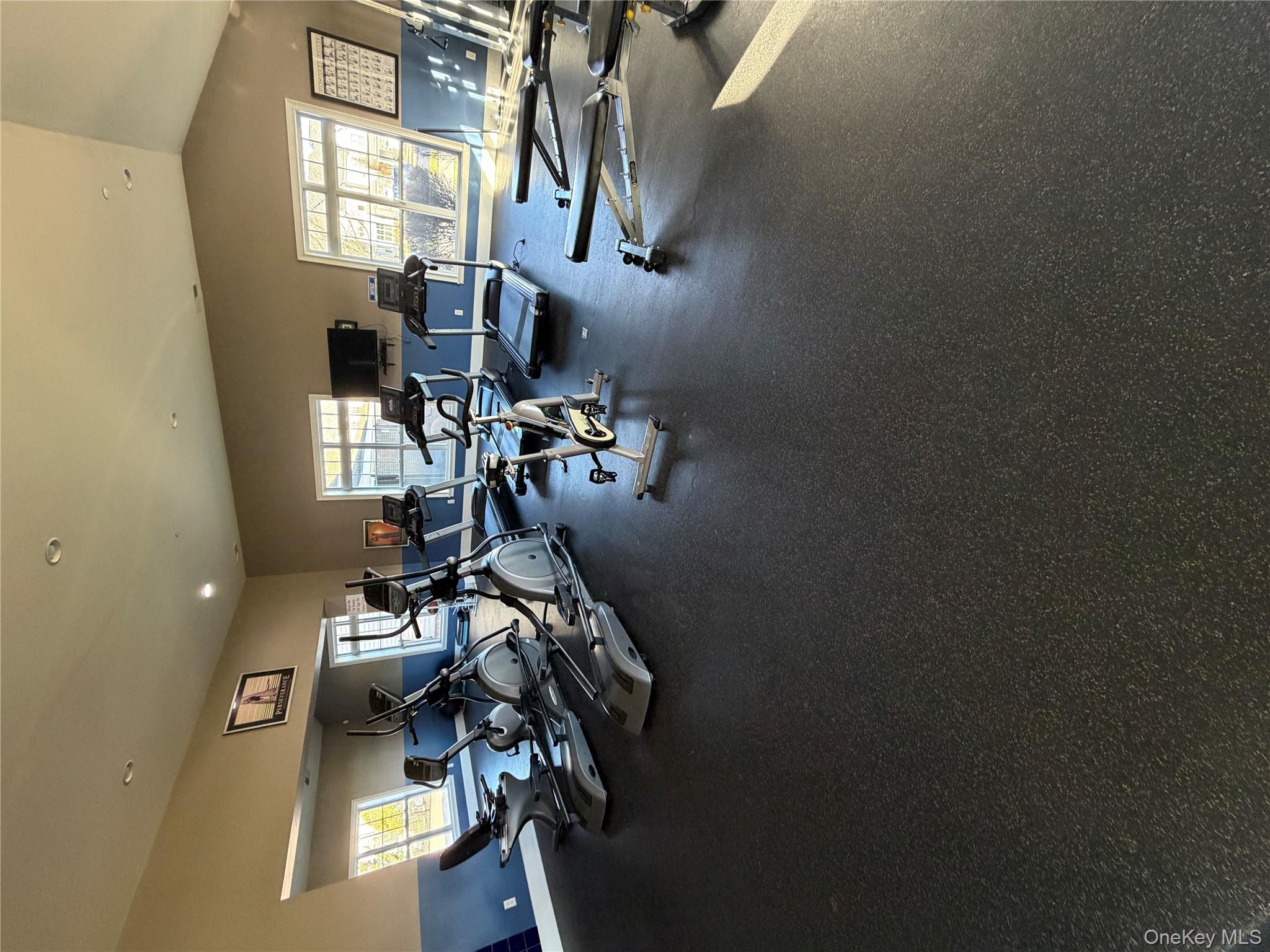 45 Lewis Road Hopewell Junction, NY 12533 - Photo 31 of 34 a room with lots of chairs and a projector screen