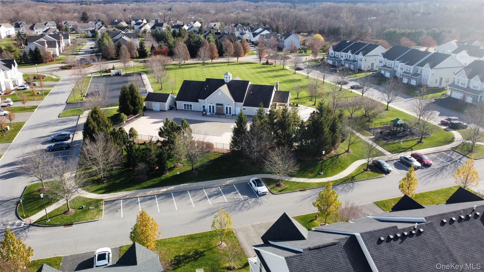 45 Lewis Road Hopewell Junction, NY 12533 - Photo 4 of 34 an aerial view of residential houses with outdoor space and swimming pool
