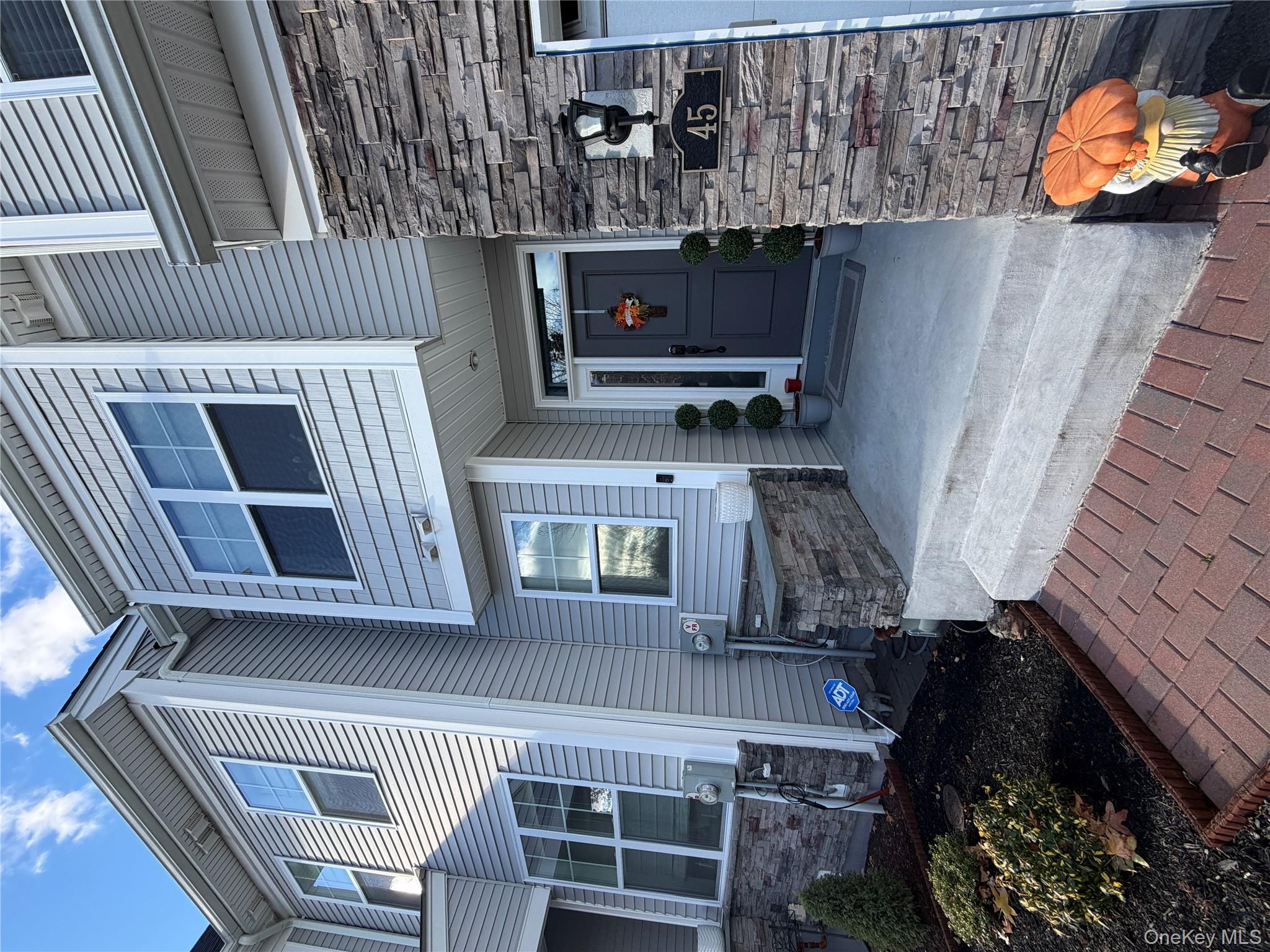 45 Lewis Road Hopewell Junction, NY 12533 - Photo 6 of 34 a front view of a house with a yard