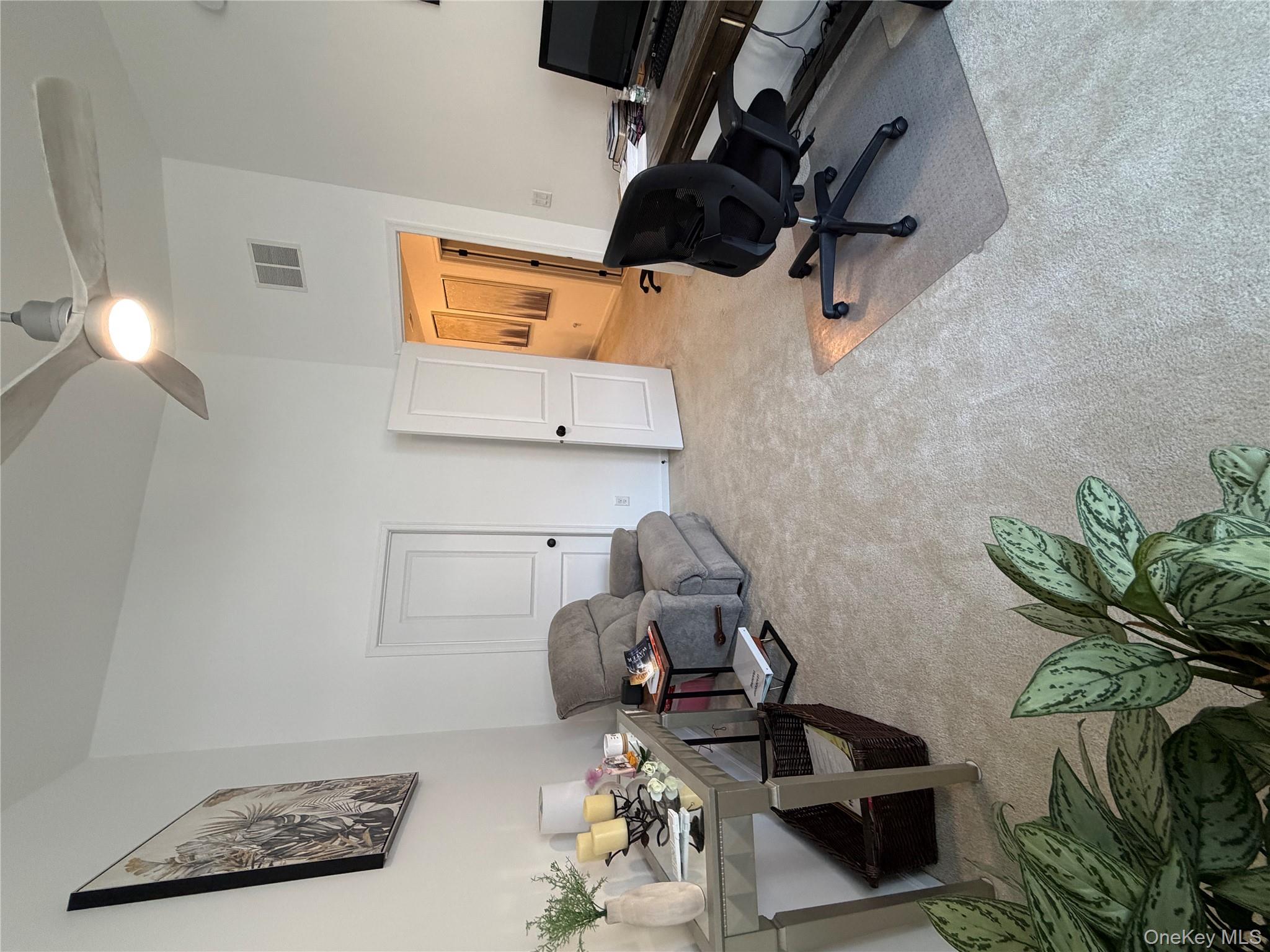 45 Lewis Road Hopewell Junction, NY 12533 - Photo 10 of 34 a bedroom with furniture and a bed