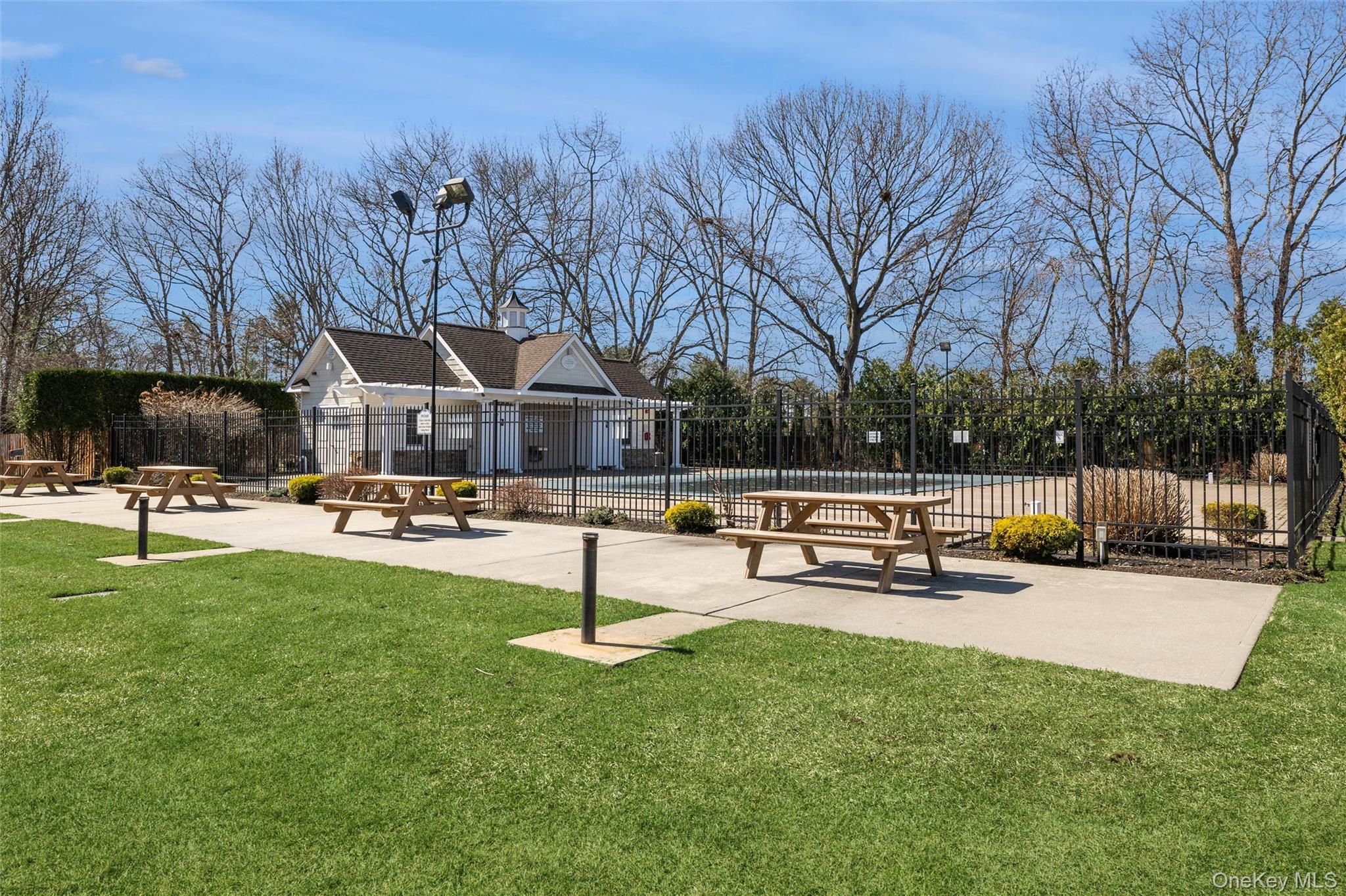 460 Old Town Road, Unit 20F Port Jefferson Station, NY 11776 - Photo 18 of 22 a view of a park with sitting area