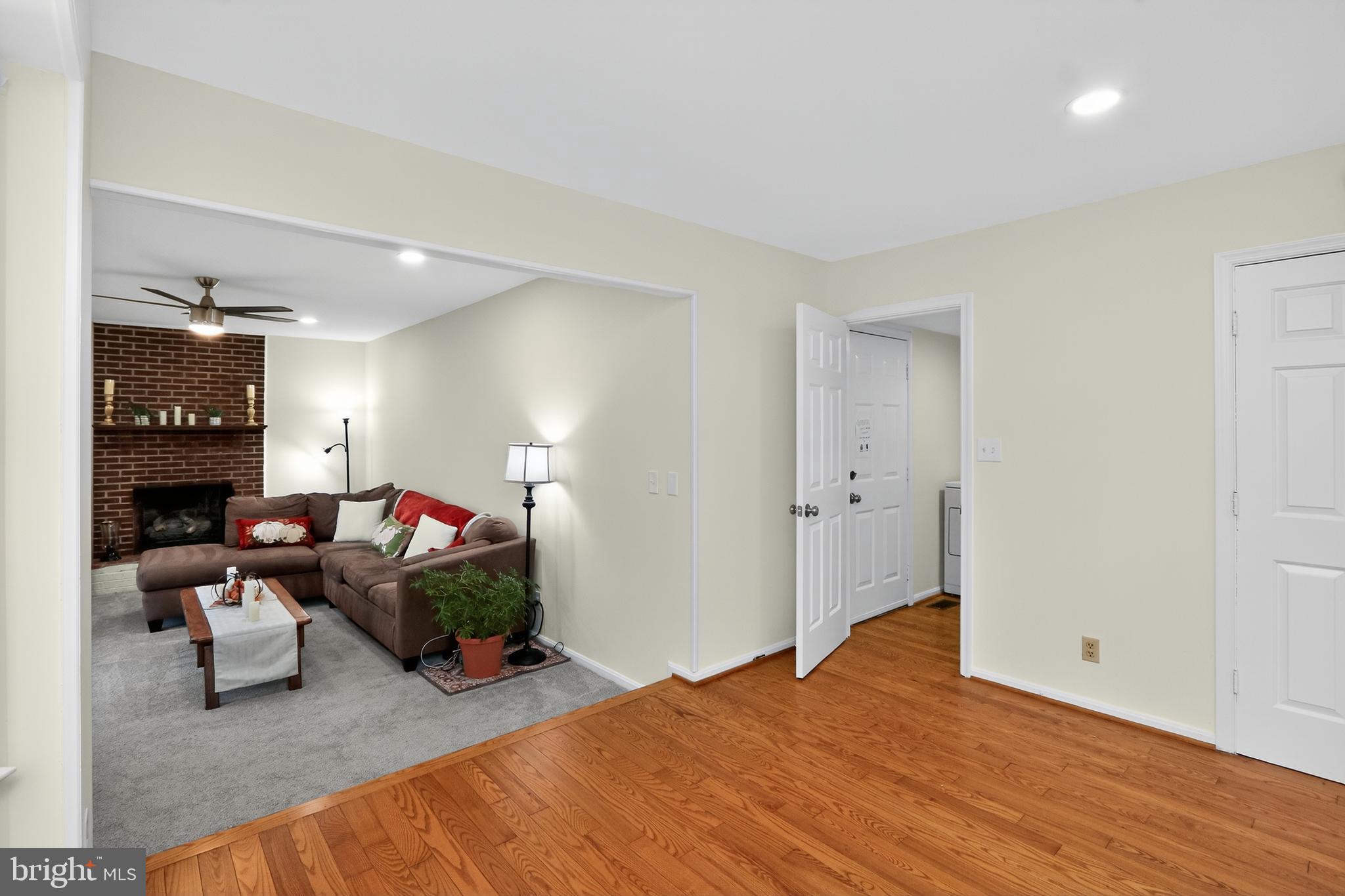 111 Oaklawn Road Stafford, VA 22554 - Photo 11 of 50 a living room with furniture and a fireplace