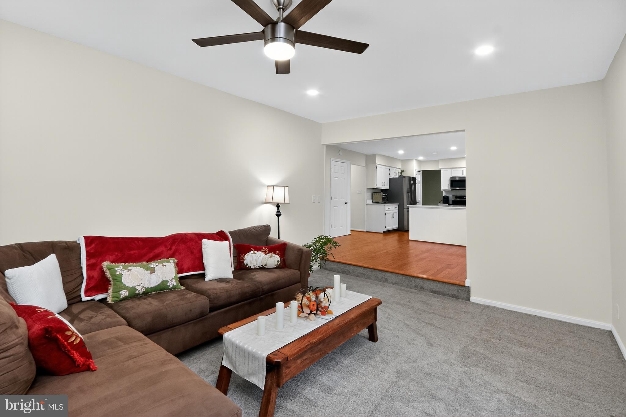 111 Oaklawn Road Stafford, VA 22554 - Photo 12 of 50 a living room with furniture and kitchen view