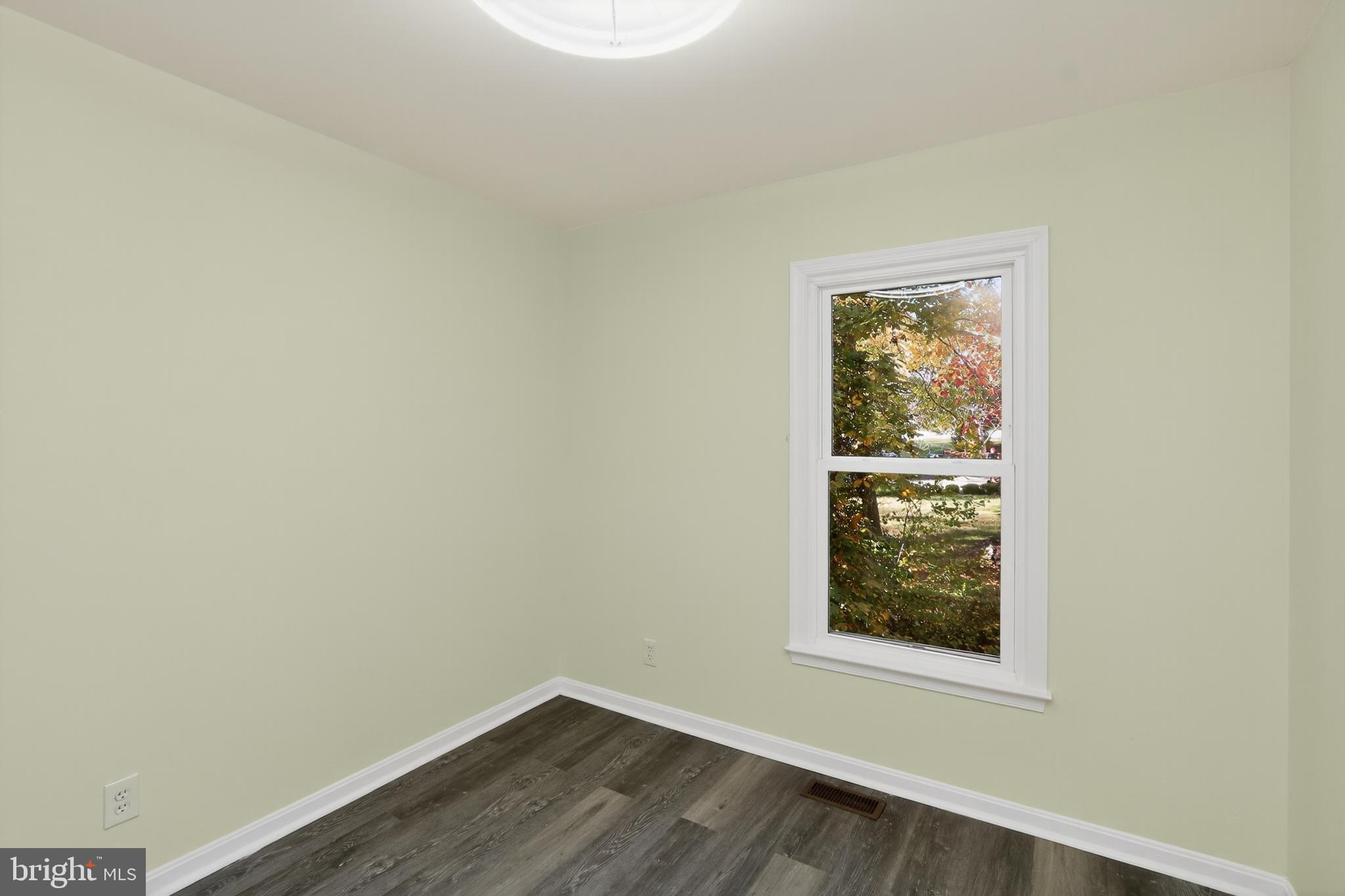 111 Oaklawn Road Stafford, VA 22554 - Photo 15 of 50 a view of a small space with wooden floor and a window