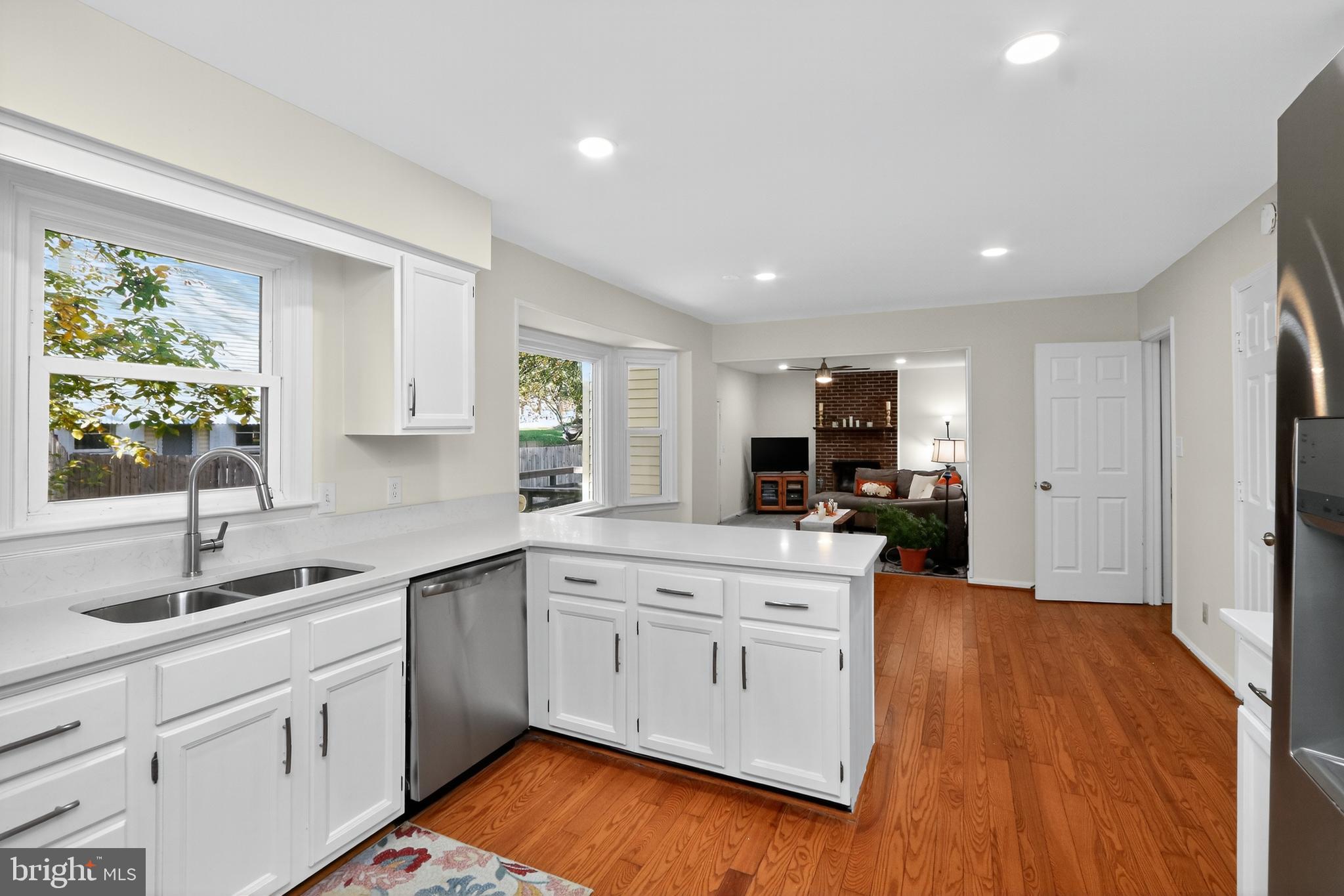 111 Oaklawn Road Stafford, VA 22554 - Photo 20 of 50 a kitchen with white cabinets and sink