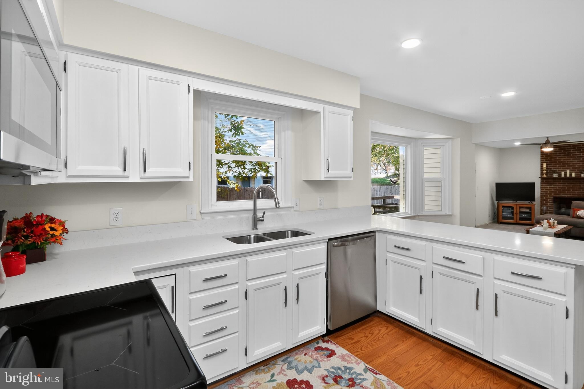 111 Oaklawn Road Stafford, VA 22554 - Photo 21 of 50 a kitchen with white cabinets and white appliances