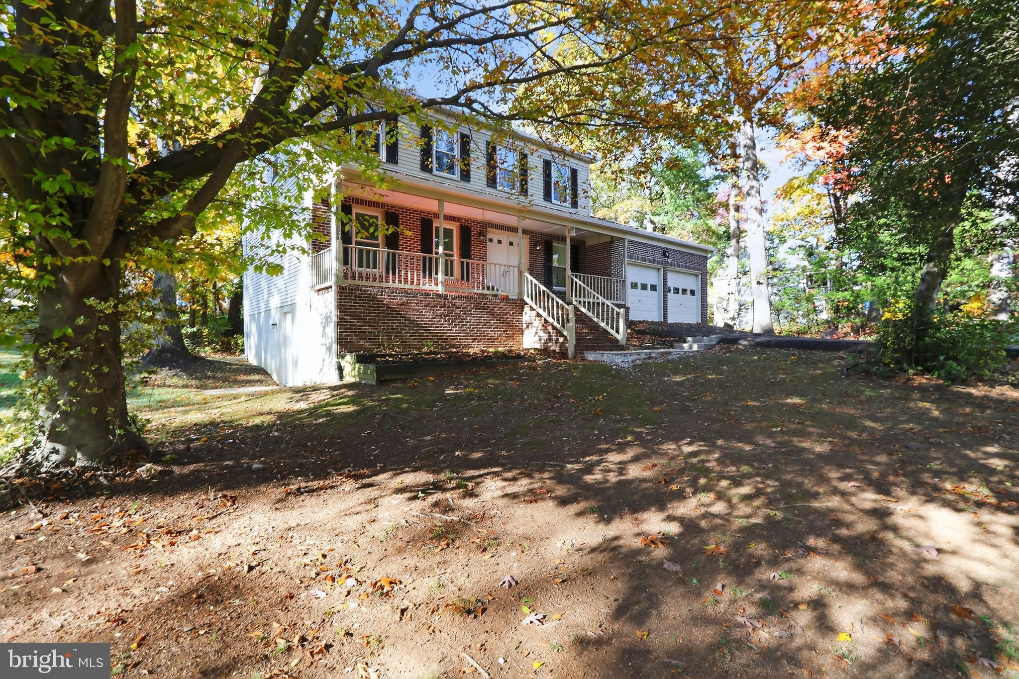 111 Oaklawn Road Stafford, VA 22554 - Photo 3 of 50 a front view of a house with a yard