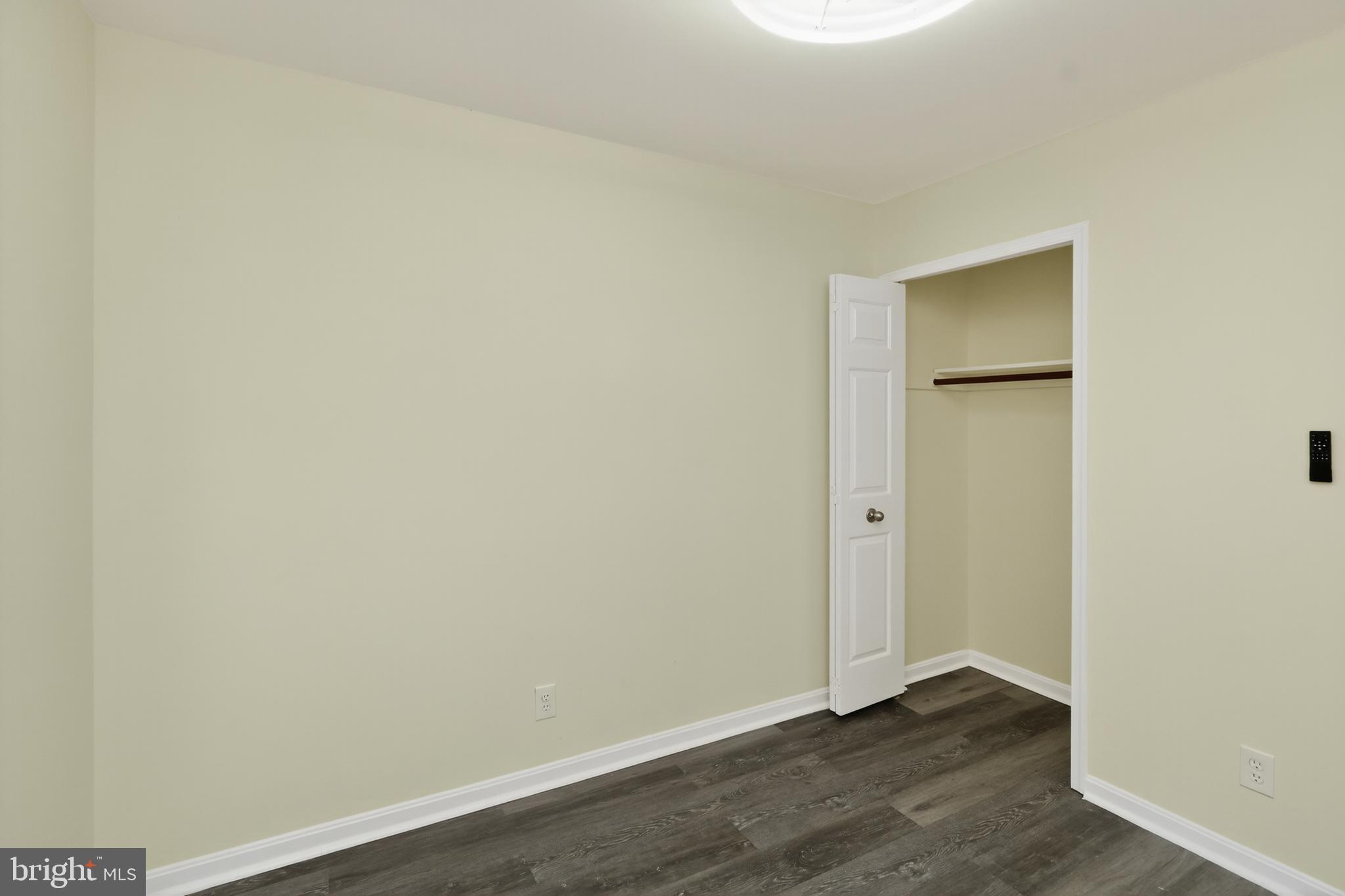 111 Oaklawn Road Stafford, VA 22554 - Photo 32 of 50 an empty room with wooden floor and closet