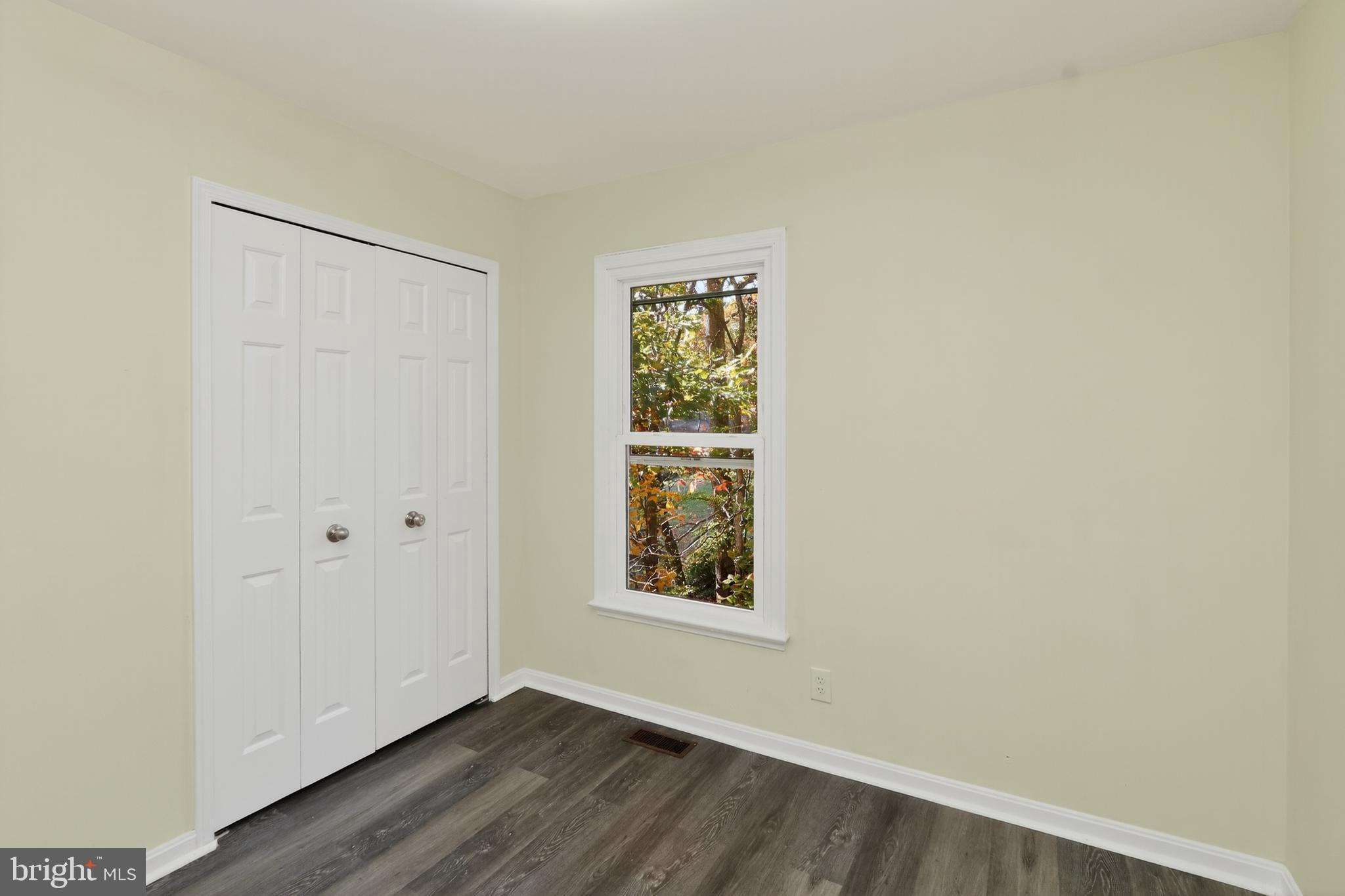 111 Oaklawn Road Stafford, VA 22554 - Photo 34 of 50 an empty room with wooden floor and windows