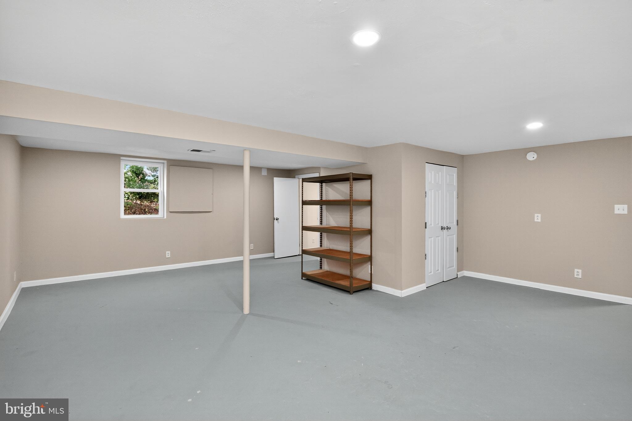 111 Oaklawn Road Stafford, VA 22554 - Photo 45 of 50 a view of an empty room with a fireplace and cabinet