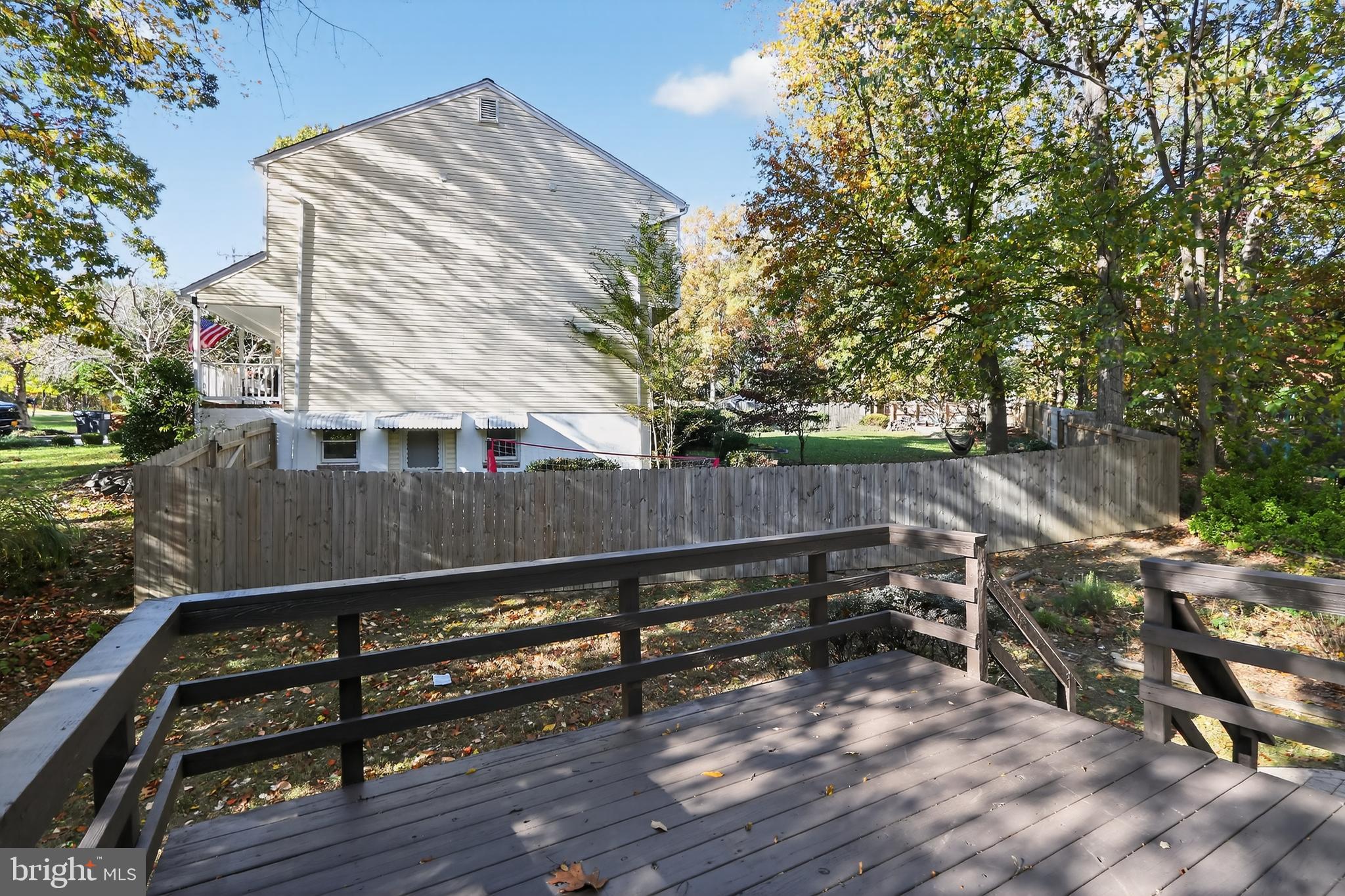 111 Oaklawn Road Stafford, VA 22554 - Photo 49 of 50 a view of backyard with wooden fence and large trees